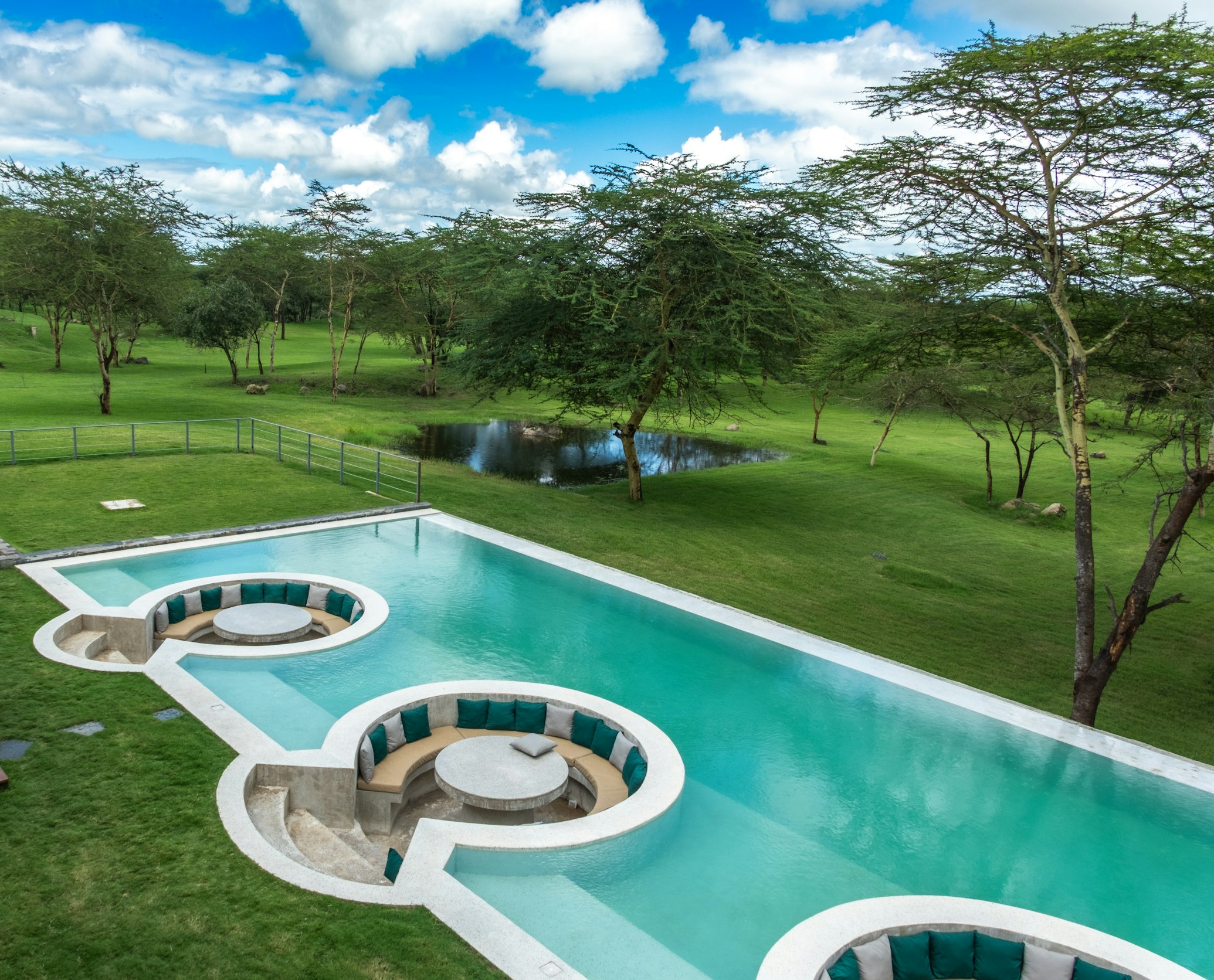 Sunset view of a luxury pool deck