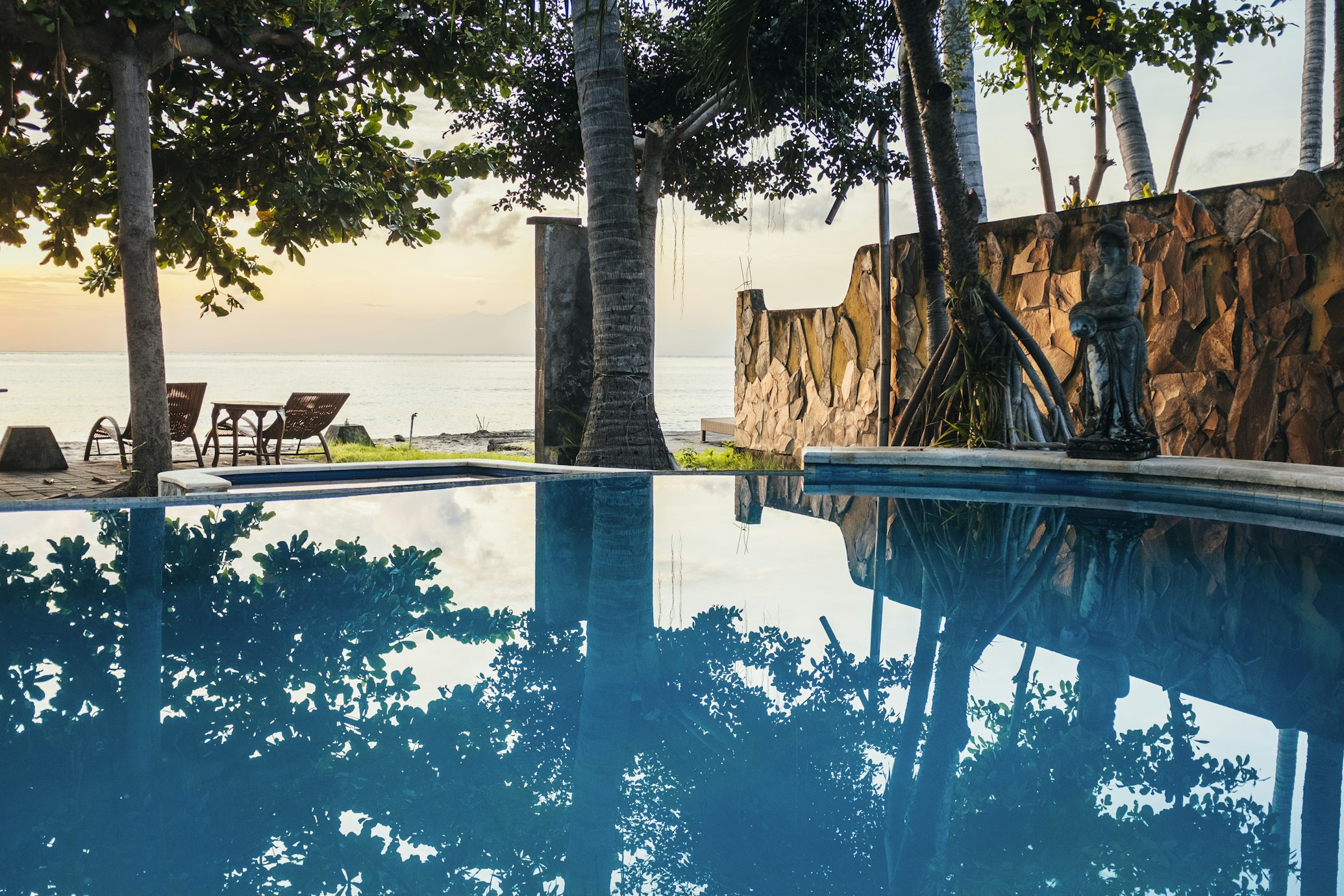 Luxury infinity pool at sunset